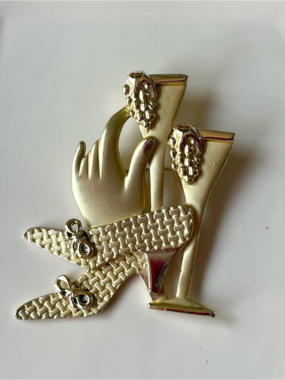 Vintage Gold Tone Brooch Featuring A Stylized Hand Holding Wine Glass 1980s